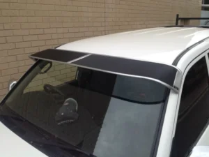 Toyota Land Cruiser 300 Series Mesh Windscreen Sunvisor An ornamesh, black powder coated mesh sunvisor provides shade at all times. With alloy surrrounds and stainless steel end clips, made strong to last for years. Increases driver and passenger comfort by eliminating glare and heat. Available to suit almost all passenger vehicles, vans, 4WDs and trucks, giving filtered shade. Individually manufactured to suit different models. Made here on the premises at factory direct prices. Typically fitted with self tapping screws to side pillars.